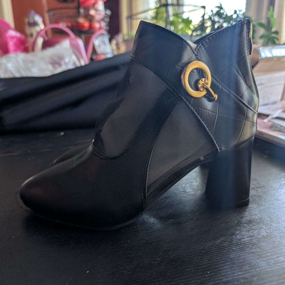 Elegant Black Ankle Boots with Gold Accent